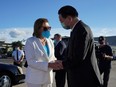 U.S. House of Representatives Speaker Nancy Pelosi talks with Taiwan Foreign Minister Joseph Wu before boarding a plane at Taipei Songshan Airport in Taipei, Taiwan, Wednesday, Aug. 3, 2022.