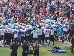 A fan was injured Wednesday after players for the Carolina Panthers and New England Patriots got into a fight at a joint practice in Foxboro, Mass.