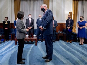 Taiwan President Tsai Ing-wen meets Indiana Governor Eric Holcomb at the presidential office in Taipei, Taiwan in this handout image released Monday, Aug. 22, 2022.