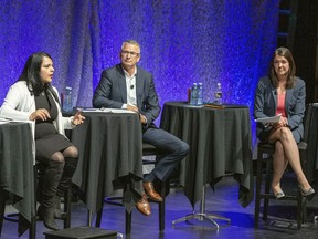 From left, candidates Rajan Sawhney, Travis Toews and Danielle Smith take part in the United Conservative Party of Alberta’s final leadership debate, in Edmonton on Tuesday, August 30, 2022.