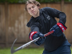 Connor Bedard in the backyard of his parent's North Vancouver, B.C., home on June 18, 2022. Bedard, a player for the Western Hockey League's Regina Pats, is projected to be a first-round pick in the 2023 NHL Draft.