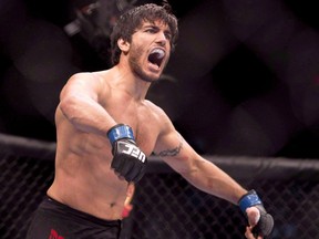 Elias (The Spartan) Theodorou celebrates his win over Sheldon Wescott at the UFC Fight Night in Quebec City, Wednesday, April 16, 2014.