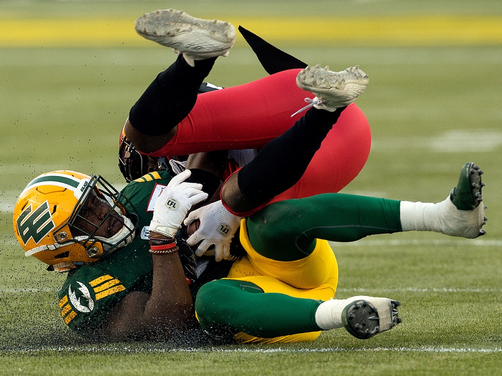 Edmonton Elks running back Kevin Brown doesn't go down without a fight