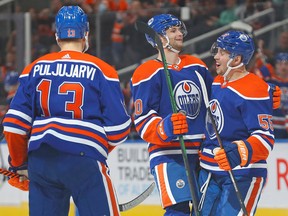 Sep 25, 2022; Edmonton, Alberta, CAN; Edmonton Oilers celebrate the goal by defensemen Markus Neimelainen (80) during the first period against the Winnipeg Jets at Rogers Place.