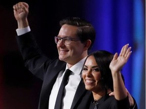 Pierre Poilievre and his wife, Ana, celebrate after he is elected as the new leader of Canada's Conservative Party in Ottawa, on Sept. 10, 2022.