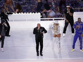 Eminem, Kendrick Lamar, Dr. Dre, Mary J. Blige, 50 Cent and Snoop Dogg, from left, perform during the halftime show during the NFL Super Bowl 56 football game between the Los Angeles Rams and the Cincinnati Bengals on Feb. 13, 2022, in Inglewood, Calif.
