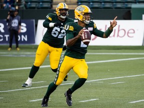 Edmonton Elks quarterback Tre Ford (2) throws the ball against the Calgary Stampeders at Commonwealth Stadium in Edmonton on July 7, 2022.