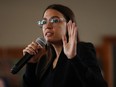 Rep. Alexandria Ocasio-Cortez (D-NY) speaks during a campaign event with Democratic presidential candidate Sen. Bernie Sanders (I-VT) at La Poste January 26, 2020 in Perry, Iowa. (Photo by Chip Somodevilla/Getty Images)