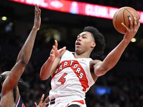 Raptors forward Scottie Barnes (4) drives to the basket against the Philadelphia 76ers in the second half during game six of the first round for the 2022 NBA playoffs at Scotiabank Arena.