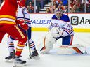 Edmonton Oilers goaltender Stuart Skinner (74) guards his net against the Calgary Flames during the first period at Scotiabank Saddledome on Saturday, Oct. 29, 2022.