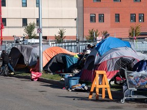 October 1, 2022. Homeless camp across the street as Premier Jason Kenney and government officials at Herb Jameson Centre discuss actions the government is taking to address addiction and homelessness in Alberta.