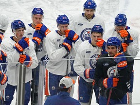 Edmonton Oilers listen to head coach Jay Woodcroft during a team practice on Tuesday, Oct. 11, 2022, in preparation for season opening home game against the Vancouver Canucks on Wednesday Oct. 12, 2022.