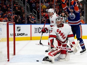 The Edmonton Oilers' Zach Hyman (18) celebrates a goal against the Carolina Hurricanes Frederik Andersen (31) during first period NHL action at Rogers Place in Edmonton, Thursday Oct. 20, 2022. Photo By David Bloom