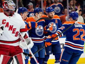 The Edmonton Oilers celebrate a goal against the Carolina Hurricanes during first period NHL action at Rogers Place in Edmonton, Thursday Oct. 20, 2022.