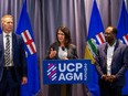 Danielle Smith speaks at UCP annual general meeting beside Lethbridge East MLA Nathan Neudorf, Deputy Premier, Infrastructure Minister and Deputy Premier and Minister of Skilled Trades and Professions, Kaycee Madu on Saturday, Oct. 22, 2022 at the River Cree Resort and Casino.