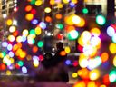 People in Edmonton visit the giant Christmas tree in Churchill Square during the Downtown Edmonton Holiday Lights on Friday, November 27, 2020. This annual event is hosted by the Downtown Business Association, but in 2022 it won't be centered around a big Christmas tree. point.