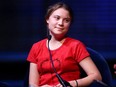 Swedish climate activist Greta Thunberg speaks with British journalist Samira Ahmed (not pictured) on stage at the Royal Festival Hall during the launch event of her new book "The Climate Book", during The Southbank Centre’s London Literature Festival, in London, Sunday, Oct. 30, 2022.