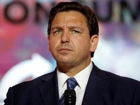 Republican Florida Governor Ron DeSantis, running for re-election as the Governor of Florida in the 2022 U.S. midterm elections, pauses as he speaks on stage at the Turning Point USA's Student Action Summit in Tampa, Fla., July 22, 2022.