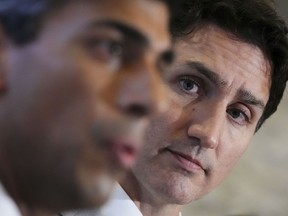 Prime Minister Justin Trudeau and Britain's Prime Minister Rishi Sunak deliver a joint statement and take questions on the side-lines of the G20 Leaders Summit in Bali, Indonesia, Wednesday, Nov. 16, 2022, following the incident in Poland.