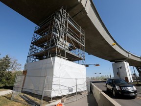Scaffolding now surrounds some of the concrete pillars along the elevated section of the Valley Line LRT. On Friday is was announced 30 of the 45 piers will need reinforcement, up from the 18 initially estimated.