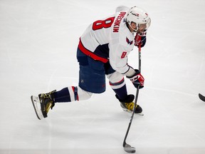 Washington Capitals Alex Ovechkin (8) fires the puck on the Edmonton Oilers during second period NHL action on March 9, 2022, in Edmonton.