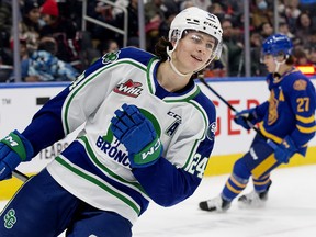 Josh Filmon (24) of the Swift Current Broncos celebrates a goal against the Edmonton Oil Kings at Rogers Place in Edmonton on Friday, December 16, 2022.