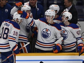 Oilers left wing Zach Hyman (18) is congratulated after scoring his third goal of the game against Nashville on Tuesday night. 
The Oilers won 6-3.