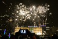 Fireworks are launched from Stanley A. Milner Library during New Year's Eve festivities in Sir Winston Churchill Square in Edmonton on Dec. 31, 2014.