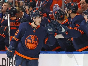 The Edmonton Oilers celebrate a goal scored by forward Ryan Nugent-Hopkins  during a game against the Arizona Coyotes on Dec. 7, 2022.