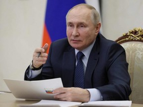 Russian President Vladimir Putin holds the annual meeting of the Presidential Council for Civil Society and Human Rights, via video conference, in Moscow, Wednesday, Dec. 7, 2022.