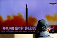 A man watches a TV broadcasting a news report on North Korea firing a ballistic missile off its east coast, in Seoul, South Korea, December 18, 2022.