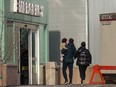 A family heads into the emergency department at the Alberta Children's Hospital on Monday, November 28, 2022.