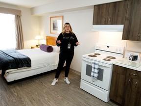 Mustard Seed Prairie Manor manager Stephanie Kurach gives a tour of a suite in the new supportive housing site, 10333 University Ave., in Edmonton Tuesday Dec. 20, 2022. Photo By David Bloom