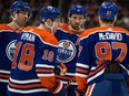 The Edmonton Oilers' Evan Bouchard (2), Zach Hyman (18), Leon Draisaitl (29) and Connor McDavid (97) during third period NHL action against the Minnesota Wild, in Edmonton Friday Dec. 9, 2022. The Oilers won 5-2. Photo By David Bloom