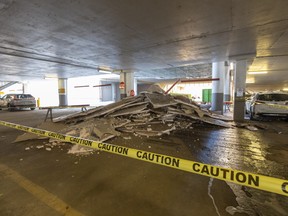 Extreme cold and a water leak caused "cosmetic damage" to a parkade ceiling at West Edmonton Mall, a spokesperson told Postmedia. Slabs of building material lie stacked below the site of the damage near entrance 56 at the west side of the mall on Dec. 22, 2022.