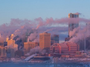 An early morning ice fog hangs over downtown Edmonton on Thursday, Dec. 22, 2022.