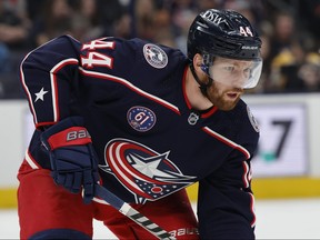 Vladislav Gavrikov of the Columbus Blue Jackets gets set during a face off in the first period against the Boston Bruins at Nationwide Arena on March 05, 2022 in Columbus, Ohio.