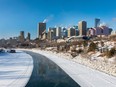 Steam rises from the North Saskatchewan River and city skyline as temperatures dip down to -28 C on Tuesday, Dec. 6, 2022, in Edmonton.