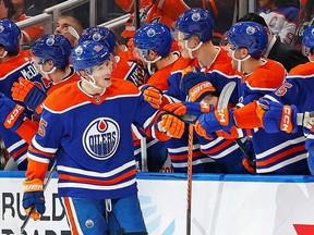 The Edmonton Oilers celebrate a goal scored by forward Dylan Holloway (55) during the second period against the New York Islanders at Rogers Place.