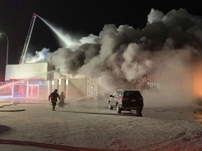 Fire crews battle a fire at a Honda dealership in Edson Dec. 30, 2019. The man who pleaded guilty to setting the fire, Thomas Berube, has lost a bid to appeal his convictions.