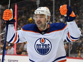 Devin Shore #14 of the Edmonton Oilers reacts after scoring a goal in the second period of a game against the Pittsburgh Penguins at PPG PAINTS Arena on  Feb. 23, 2023, in Pittsburgh, Penn.