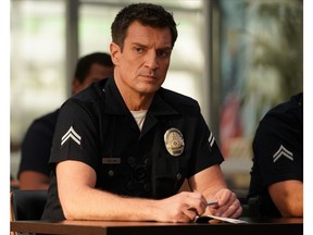 Nathan Fillion as officer John Nolan in The Rookie.