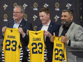 Edmonton Stingers new ownership on Thursday, Feb. 23, 2023, are James Burns, left, Reed Clarke, and Taranvir (Tank) Vander. Clarke will remain as club president while stepping into a new role as chief executive officer and partner, while Vander and Burns will act as managing partners. The team was formerly owned by the Canadian Elite Basketball League.