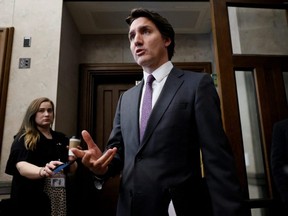 Prime Minister Justin Trudeau speaks to media in the House of Commons foyer on Parliament Hill in Ottawa, Feb. 1, 2023.