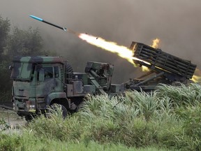 Multiple Launch Rocket System (MLRS) Thunderbolt-2000 fires rockets during the live-fire, anti-landing Han Kuang military exercise, which simulates an enemy invasion, in Taichung, Taiwan July 16, 2020.