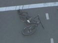 Mangled bike seen after attack that killed cyclist.