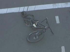 Mangled bike seen after attack that killed cyclist.
