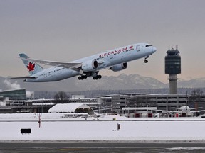 Some flights were affected by the Saturday snowstorm at Vancouver airport. Pictured here, another snowstorm Dec. 22, 2022, in which hundreds of flights were delayed or cancelled.