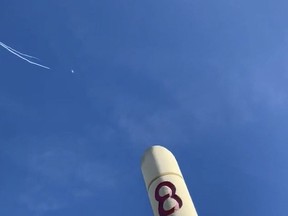 This photo provided by Jason Sellers shows U.S. air force fighter aircraft shooting down a suspected Chinese spy balloon off the Carolina coast on Saturday, Feb. 4, 2023. Opposition parties say the public deserves answers about a Chinese balloon's incursion over Canadian territory.