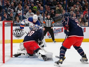 Columbus Blue Jackets goalie Joonas Korpisalo (70) stops a shot by Edmonton Oilers center Ryan Nugent-Hopkins (93) during the first period at Nationwide Arena on Feb 25, 2023.